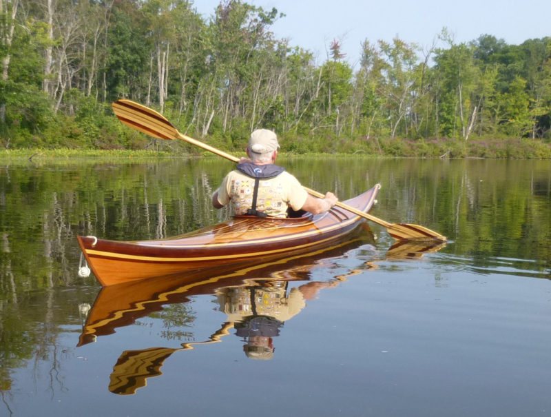 Nearly six years in the making, Tom Santor's kayak takes to the water near his lakefront home. 