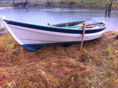 Without her beach legs, this Caledonia yawl would be resting on her planking and heeled at about 10°, the angle of her deadrise. With the legs she's level, supported by her keel and gunwales and fit for habitation.