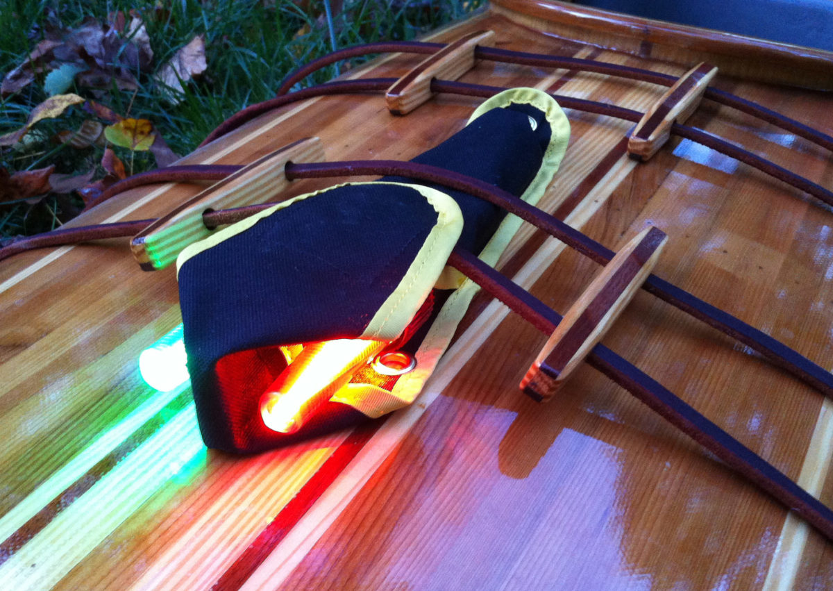 The Navlite includes port and starboard light secured in a case that can be folded to provide a baffle between the lights. It also minimizes the glare for a kayaker looking over the foredeck.