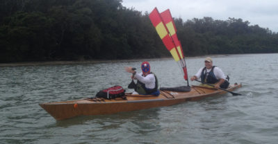 With the wind blowing out of the east, the sheetless two-meter sail provided little help. For Wally, still sporting his Los Humungos attire, and Rod lightweight canoe paddles are the best choice for the long haul in the kayak.