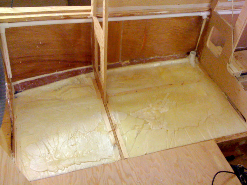 The spaces between frames below deck were filled with poured foam for flotation.