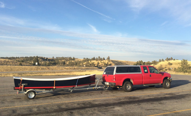 Out of the shop and onto the road, the skiff traveled 2,000 miles to get to its launching.