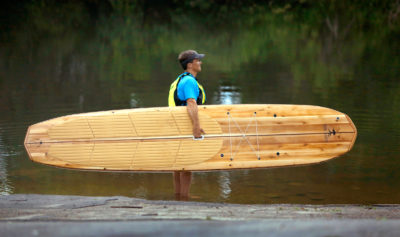 A handhold at the board's balance point makes carrying easy.