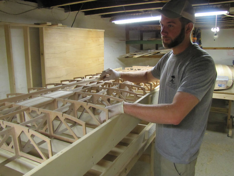 Tidal Roots boards have between 24 and 28 CNC router-cut pieces in the framework. The solid balsa blocking to the left provides a backing for the recessed hand-grip installed later.
