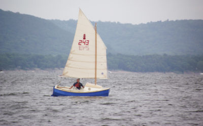 The SCAMPS's 100-sq-ft sail is set high for good visibility under the boom and is easily reefed.