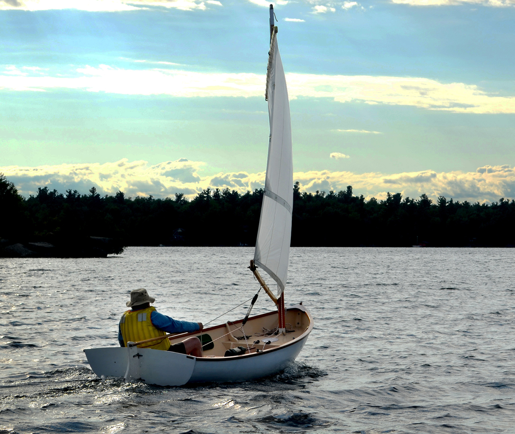 small square rigged sailboat