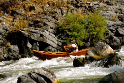 Black Bar Rapid is a Class III and normally, only the top of this rock in the middle is exposed. At low water, it becomes a big obstacle that must be missed.