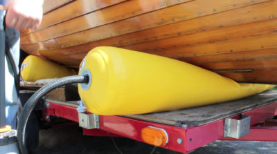 I didn't know if the pump handle the air pressure required to lift the boat, but it became evident that the weight, say 200 pounds, would be divided by the contact area, say 20 square inches at the full lift, to bring the pressure down to 10 psi.