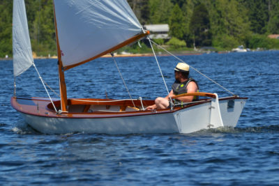 The boom and the foot of the jib are both set high, providing a clear view forward and eliminating the need to tell passengers to duck when coming about.