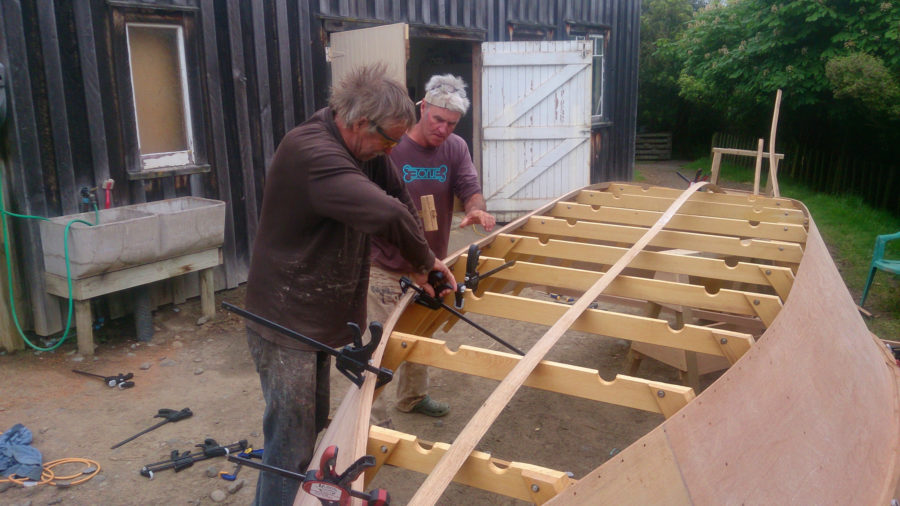 After steam bending and scarf-jointing a full length chine log, Andy and I finished the precise compound angle end-cuts to fit it tightly into the hull.