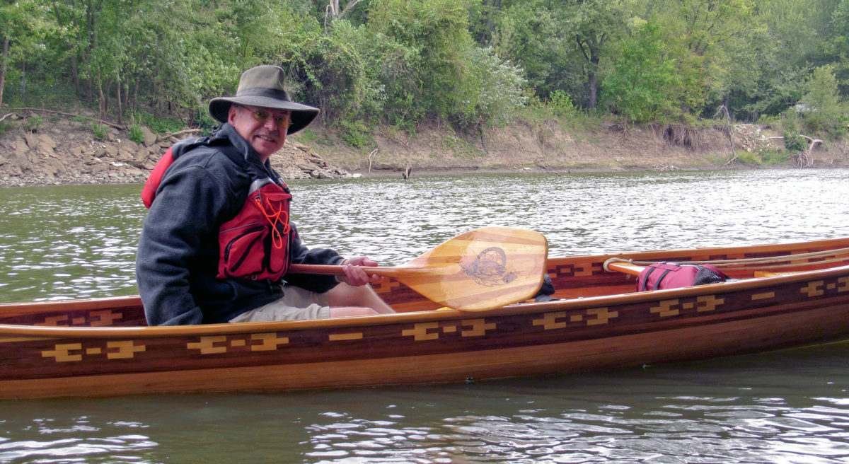 Dave made paddles for the canoe and decorated them with the same insignia he put on the canoe. He and his friend Andy Look won the wooden canoe division of the 13.5-mile Abe's RIver Race on the Sangamon River in Illinois