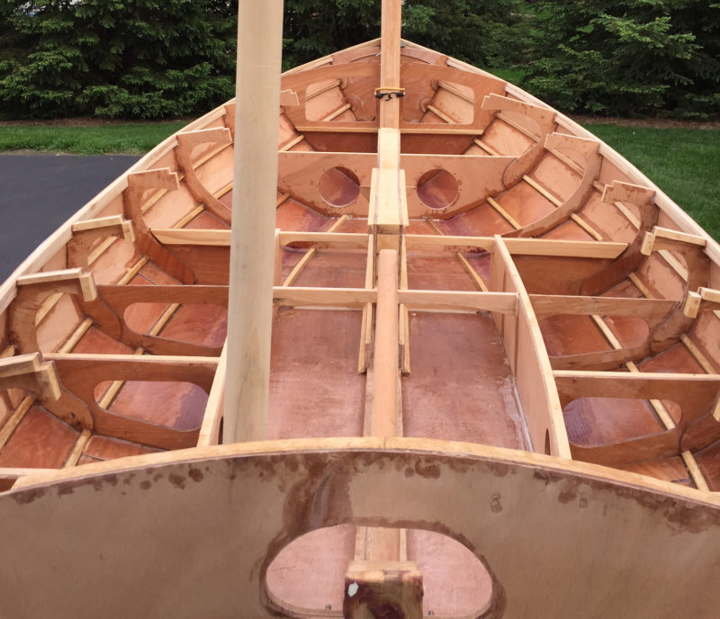 Battens set in the frames and bulkheads simplify shaping and fastening the planks. The mizzen mast is set bit to port to keep from interfering with the tiller.