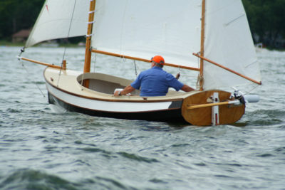 The plans call for a motor mount on the boomkin, at nearly right angles to the normal orientation. Most builders use a conventional bracket fastened to the transom.