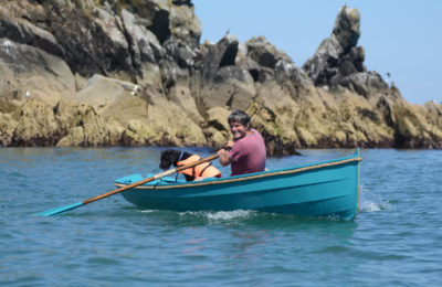 July, 2016. With a lid covering the outboard hole and the outboard itself providing ballast forward, the skiff rows better than ever. Just outside Dartmouth we usually see ten or twelve seals whenever we go to the Mew Stone.