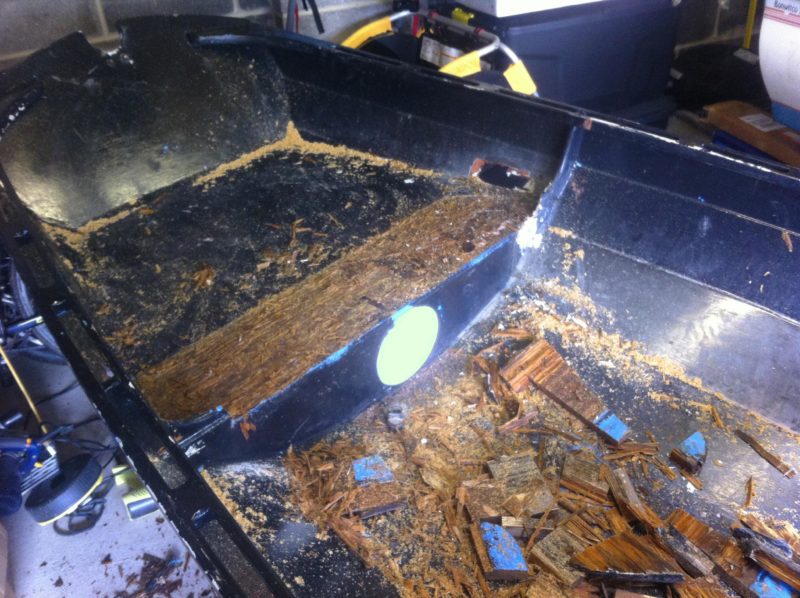 March, 2016. My poor neglected skiff. Nearly 19 years after being launched, the fore and aft thwarts were rotted away where the drains at either end got blocked. The damage spread into neighboring bits of plywood.
