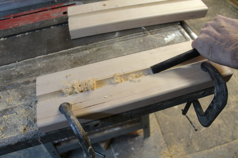 The axle itself is the tool for finishing the grooves. The working end is sawn off and occasionally sharpened with a file. The length of the axle makes it possible to apply a lot of force, and the rather crude cutting edge will produce shavings