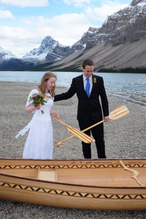 With paddles in hand, it wouldn’t be long until the couple decided to take the canoe out paddling. The wedding reception would have to wait.