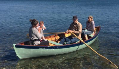 Friends and family explore the tide line. With the centerboard up, the peapod only draws 7".