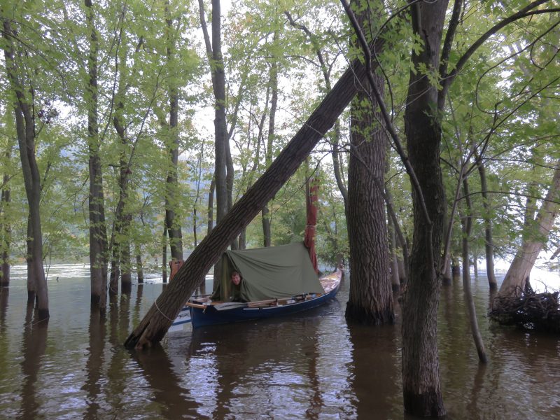 At De Soto, Wisconsin, the flooded river had us enjoying our boom tent. We walked though a nearby drainage tunnel that took use under a railroad to a lively pub where we enjoyed our first cold brews of the trip.