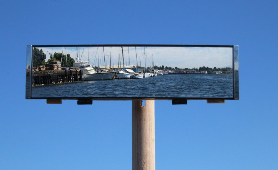 The wide-angle mirror shows what's ahead as well as enough of a view to the side to hold a course at the right distance from shore.
