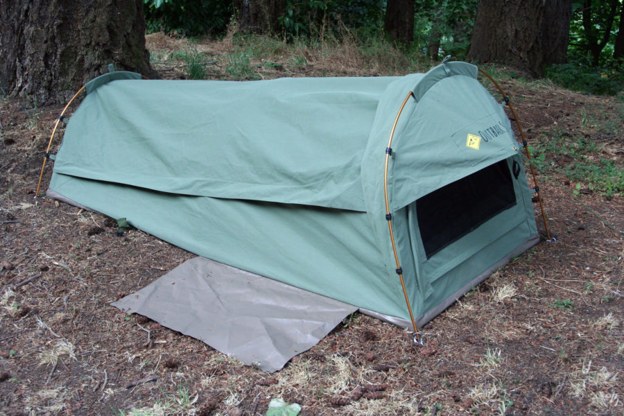 Closed up against rain or cold, the tent is cozy without feeling cramped. The attached flap of PVC vinyl provide a place to take off shoes before entering to keep dirt out of the tent.