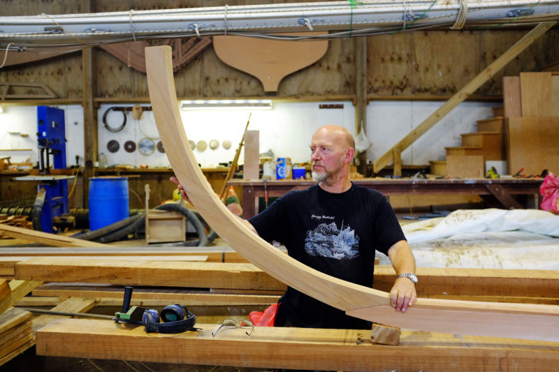 The keel was assembled in the old boathouse before we moved the project to the workshop in Russell. Ulf held the stem in place to give us our first glimpse at the shape of the boat.