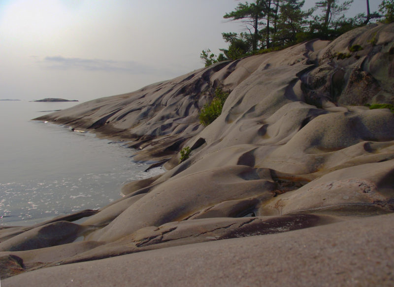 Two nights in the Fox Islands gave me lots of time to explore. While circling West Fox Island on foot, I was caught by the play of light and shadows on the wave-sculpted granite.