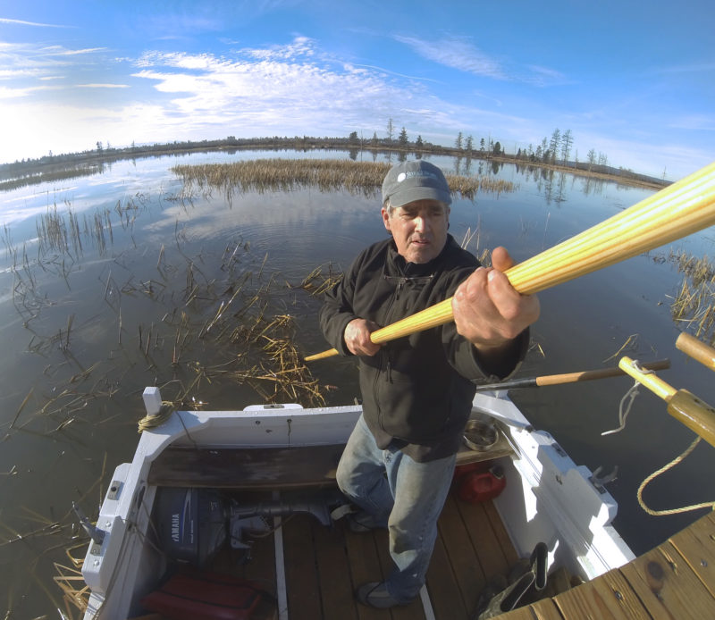 To explore a tide-flooded marsh I kicked the outboard up and used a push pole to get across the lagoon.