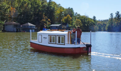 The Escargot plans include drawings and dimensions for a rudder, but BEULAH manages well enough being steered with the outboard