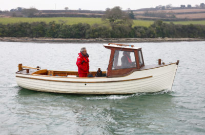 The cruising speed with the 14-hp diesel is around 5.5 knots.