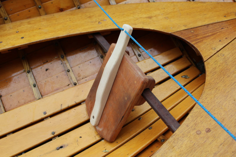 A simple stick as the tiler is easier to operate and allows the rudder to swing freely until a course correction is required.