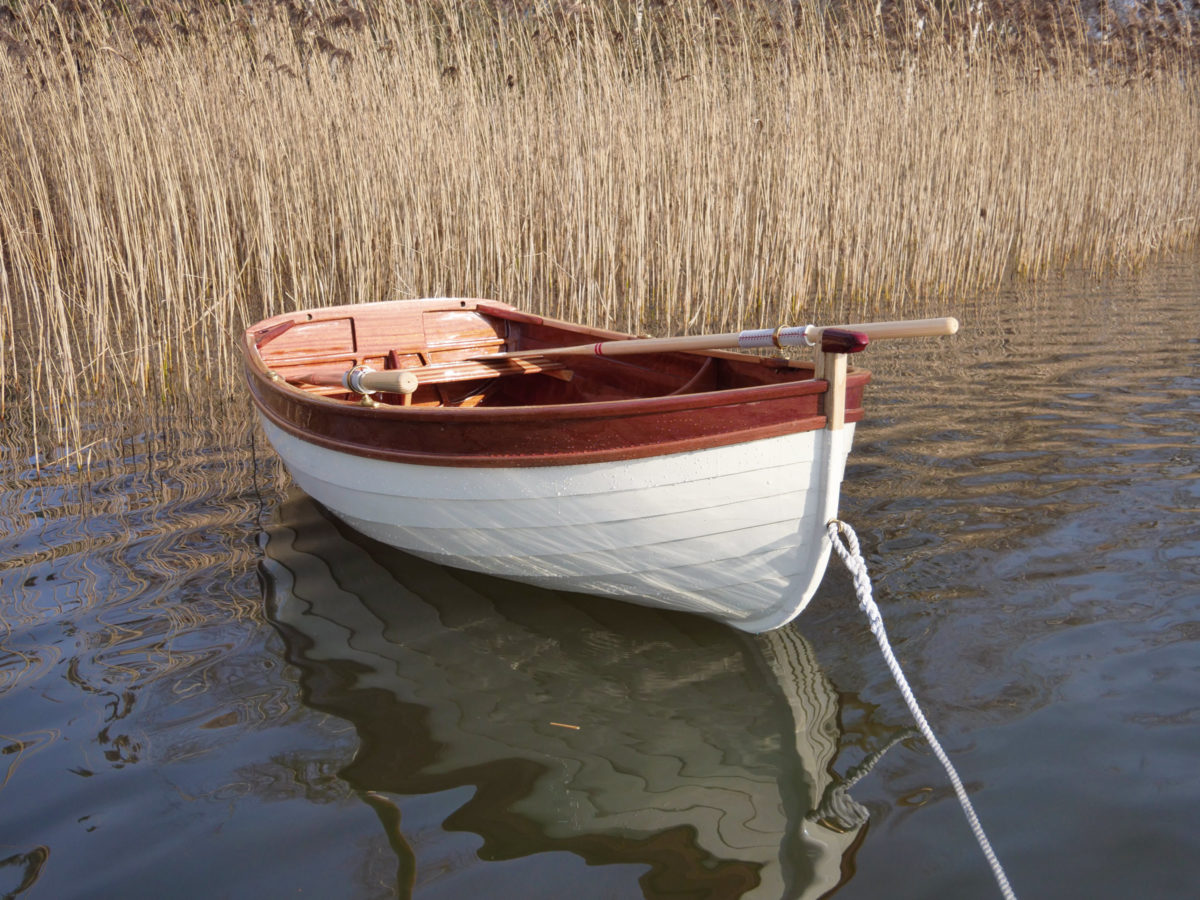 The dinghy sits lightly on the water and has enough volume to carry a complement of three.