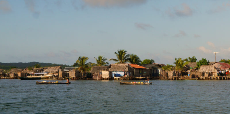 Guna women regularly paddle ulus to Rio Torti on the mainland to collect potable water from the river and gather vegetables grown in their gardens farther inland