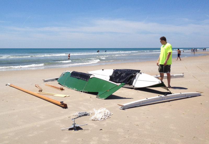 Taken apart for transport, the pieces of the Hitia 17 are light enough to be carried to the beach.