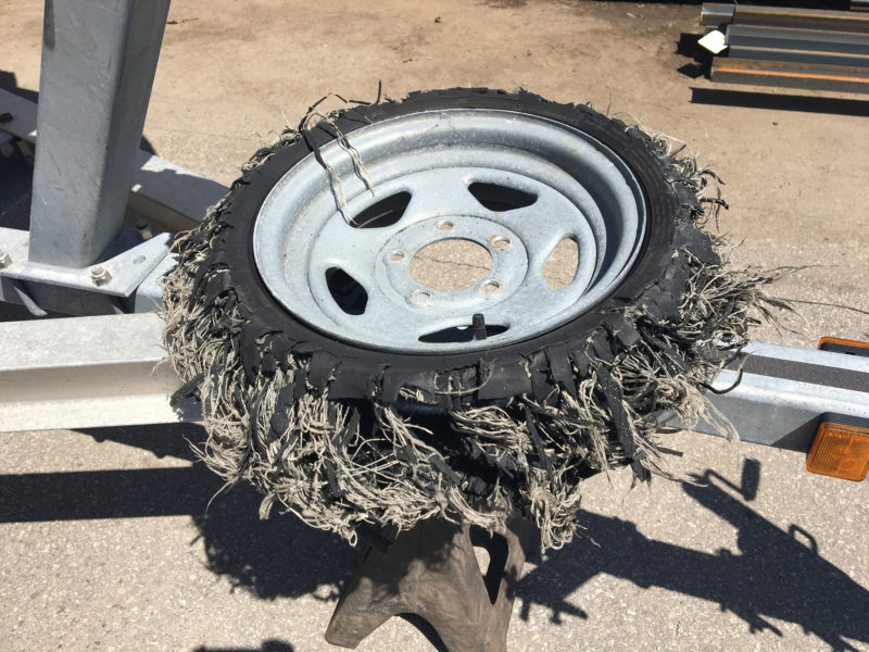 This tire was one of 3 on a dual-axle trailer that went south in a hurry. Fortunately, the boat survived and the failure of the tires didn't lead to an accident. The tires were 14 years old.