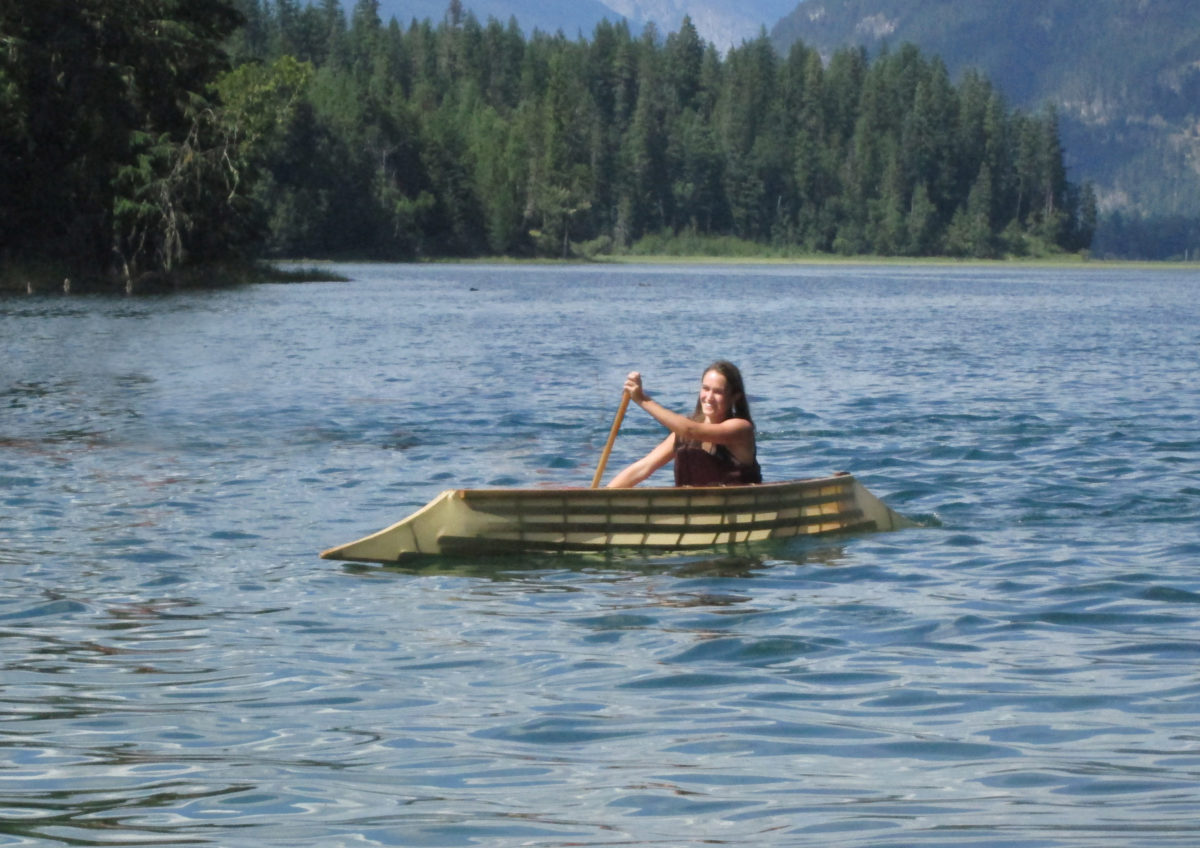 Harry takes his canoe to many riverside gatherings and lets people give it a try.