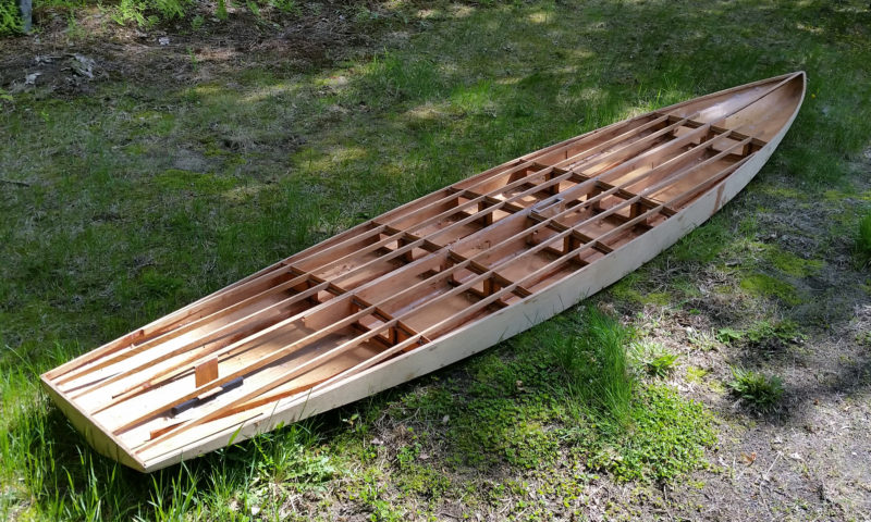 The frames are concentrated in the board's midsection where it supports the paddler's weight, leaving the ends and the overall weight light.