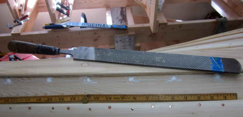 One side of the rasp is a double-cut file for finer work.