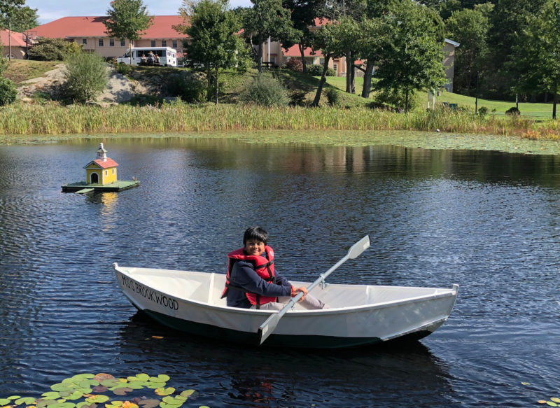 The canvas boat has held up well for the three years it has been used for students to practice rowing on the school's pond.