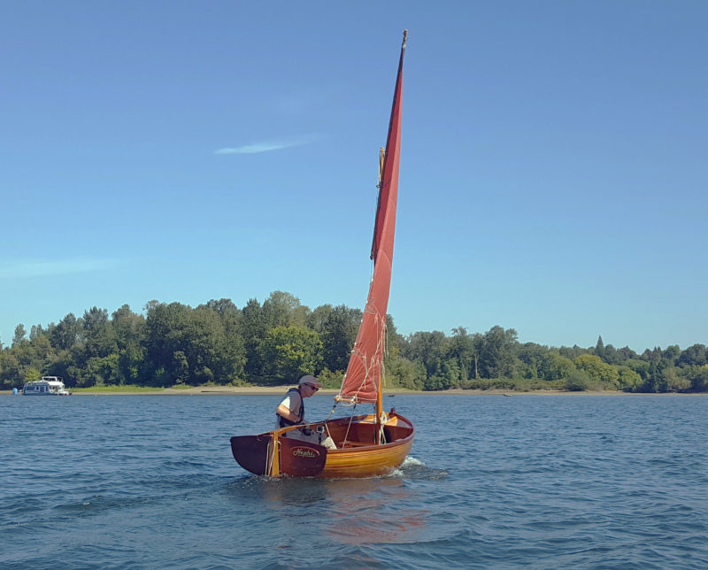 The 70-sq-ft lug sail performs well to windward, evidenced by GPS tracks showing the Morbic 11 tacking through 90 degrees.