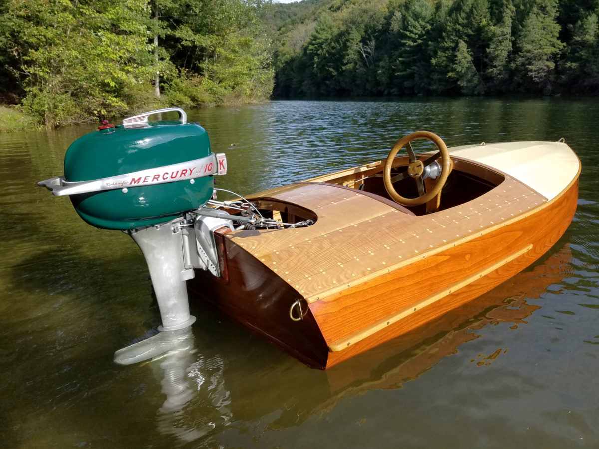 The transom eyes, wheel, and foredeck fittings were part of the vintage look of the 10' runabout.