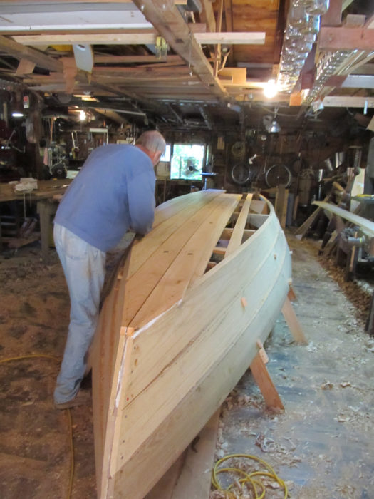 The bottom was planked foe-and-aft with seams backed up by battens.