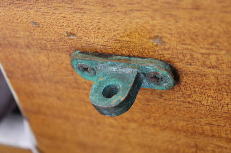 The brass gudgeons on HESPERIA's transom have a pattina of verdigris, just like the Statue of Liberty. The projecting part is made up of two layers of brass soldered together for strength and to reduce wear. I made the rudder fittings in 2011.