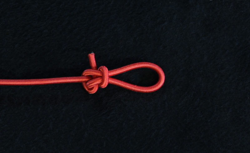Cinched up, the bungee will stay put and the knot will stay tight.