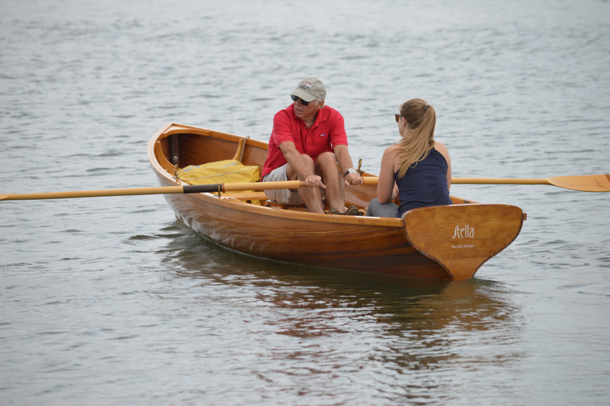 As with most rowing boats with wineglass transoms, the stern is depressed with a passenger in the stern sheets and the rower amidships and coming up to the catch. Even so, the bow remains low and the hull is not badly out of trim.