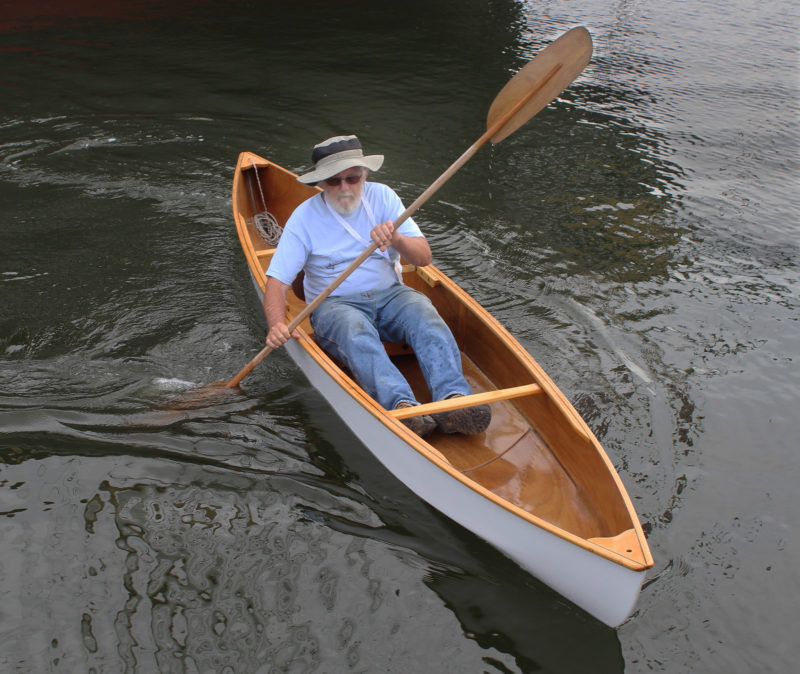 The inboard ends of the paddle blades are shape with a small lobe that sheds water before it can run along the shaft and get the paddler's hands and lap wet.