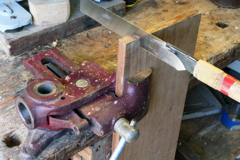 Rotate the vise and it will hold a board vertically for cutting dovetails.