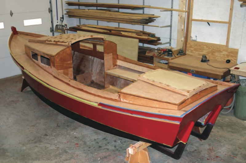 Color photograph of a partially finished Redwing outboard cruiser.