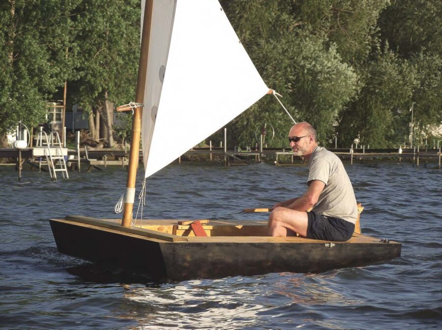 small wooden sailboat building