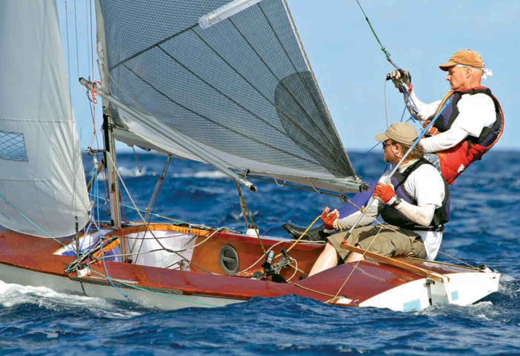 Photo of father and son sailing an International Fireball racing boat.